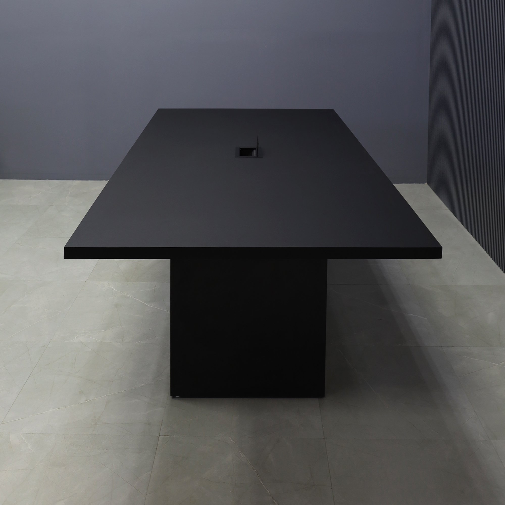 90-inch Newton Rectangular Conference Table in black traceless laminate top and  standard base, with black MX3 powerbox, shown here.