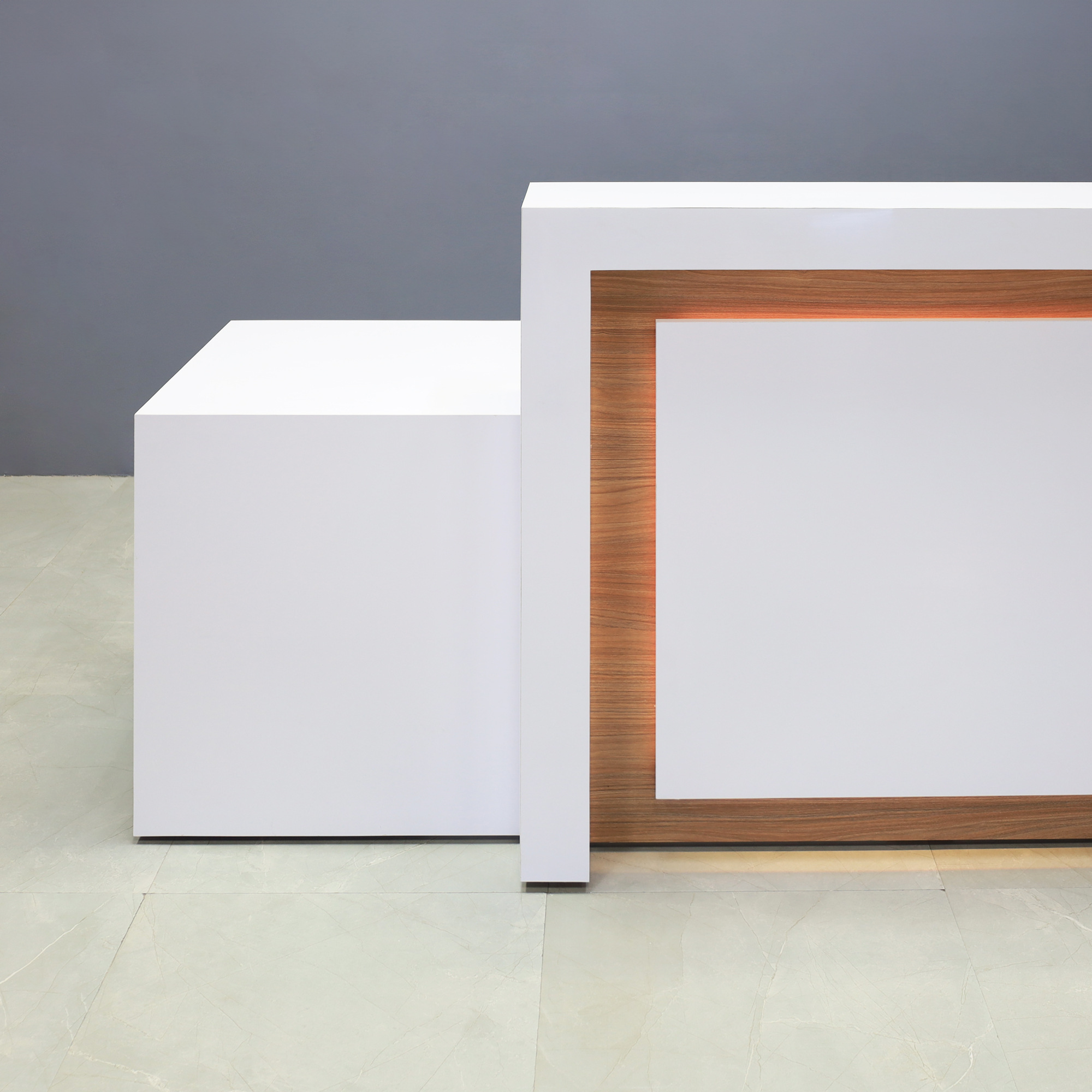 96-inch New York Extra Wide in white gloss laminate main desk & front panel, uptown walnut (discontinued) matte laminate accent recessed, and color changing LED.