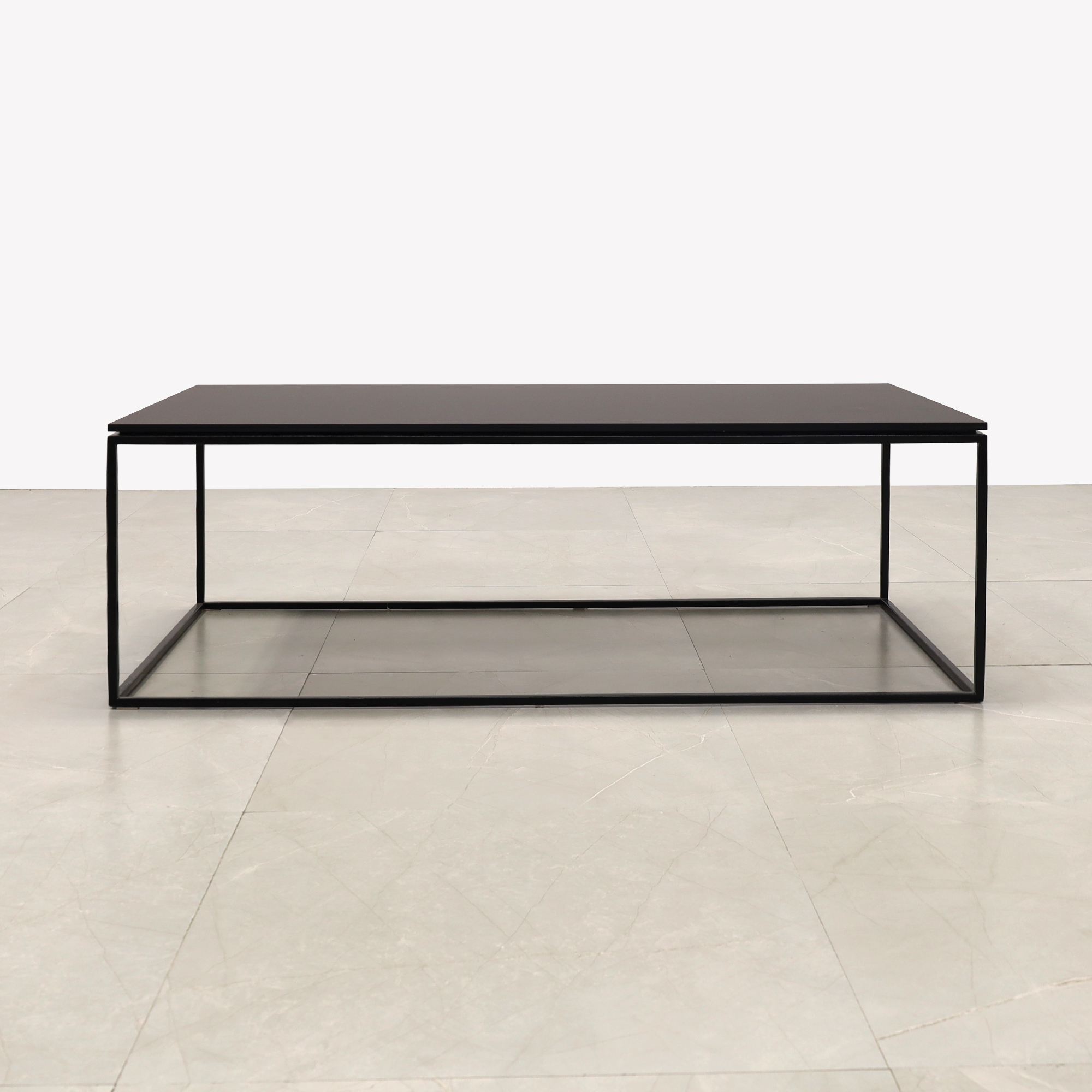 Aspen Rectangular Lobby Table in black OPAK engineered stone top and black metal frame shown here.