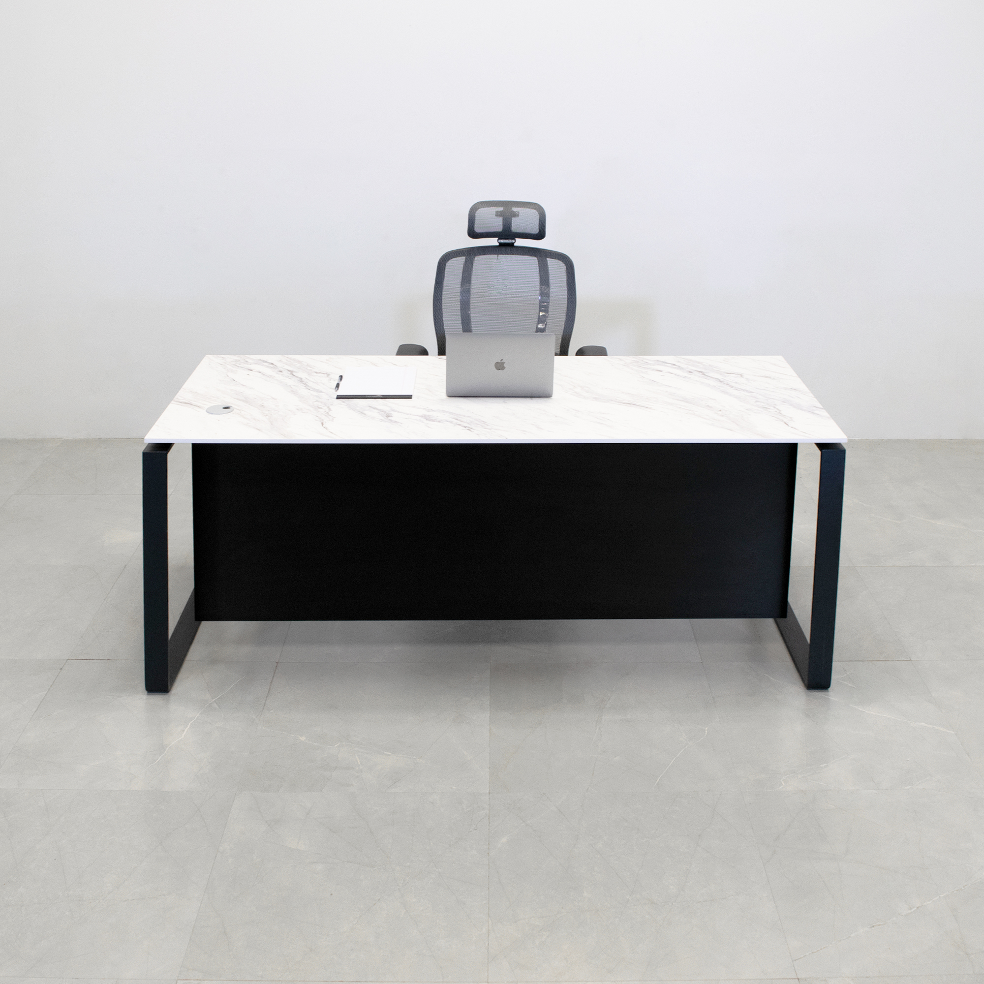 Aspen Straight Executive Desk With Engineered Stone Top in calcutta blanc top, black traceless laminate privacy panel and black metal legs shown here.