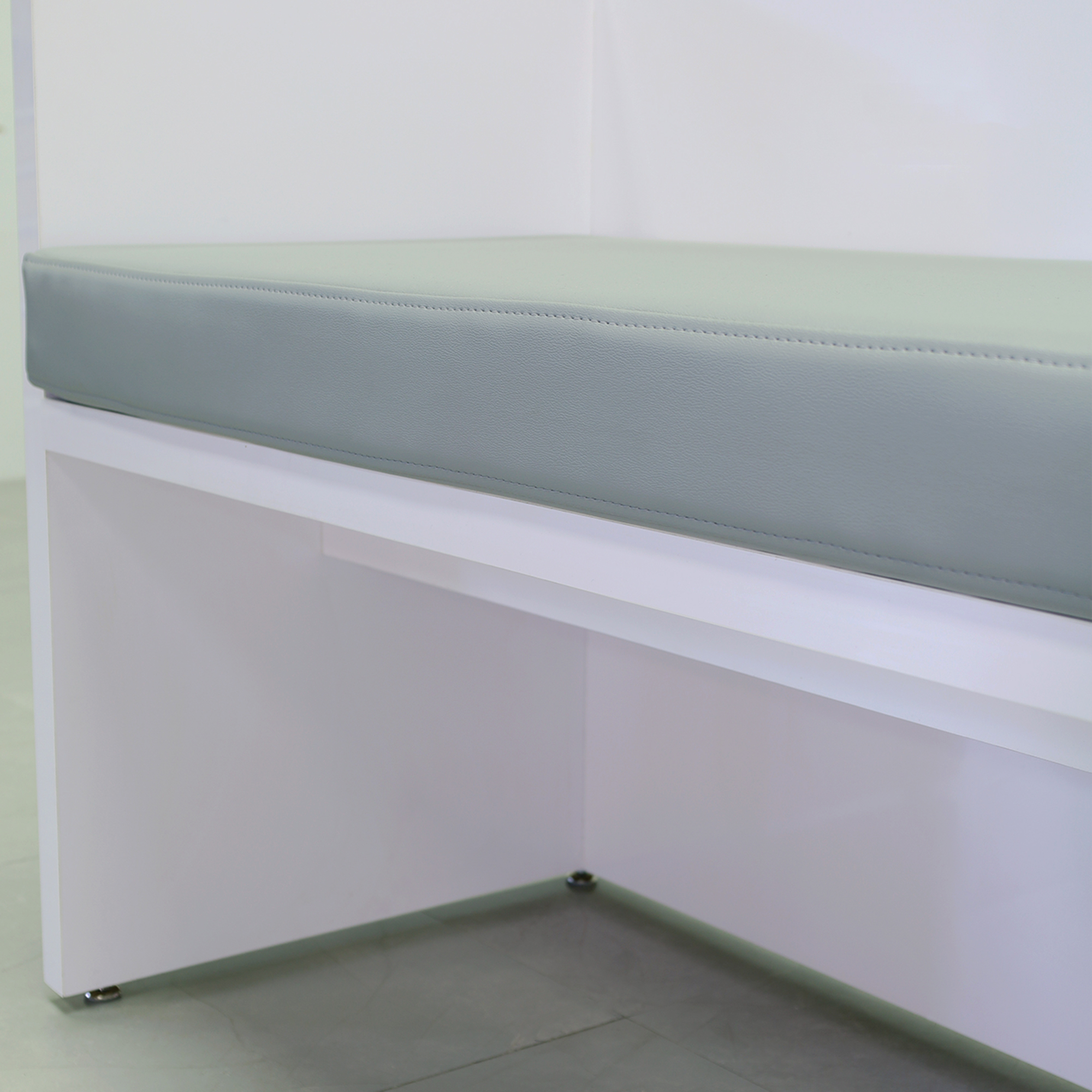 Astoria Sofa Bench with Cushion in gray leatherette and white gloss laminate finish sofa frame shown here.