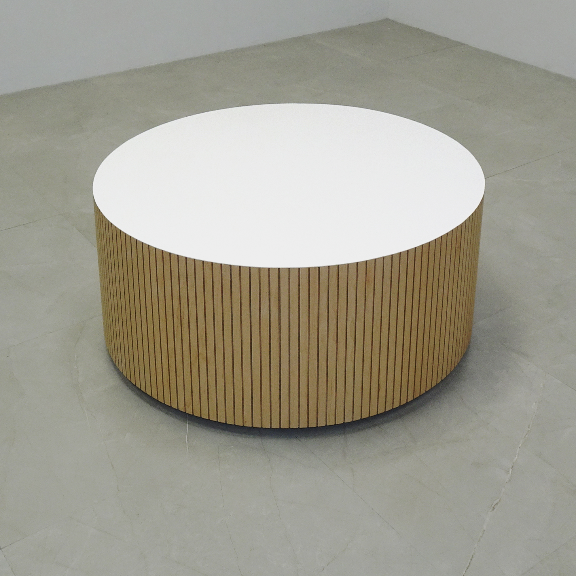 36-inch Norfolk Round Lobby Table in white gloss laminate table and maple tambour outside, shown here.