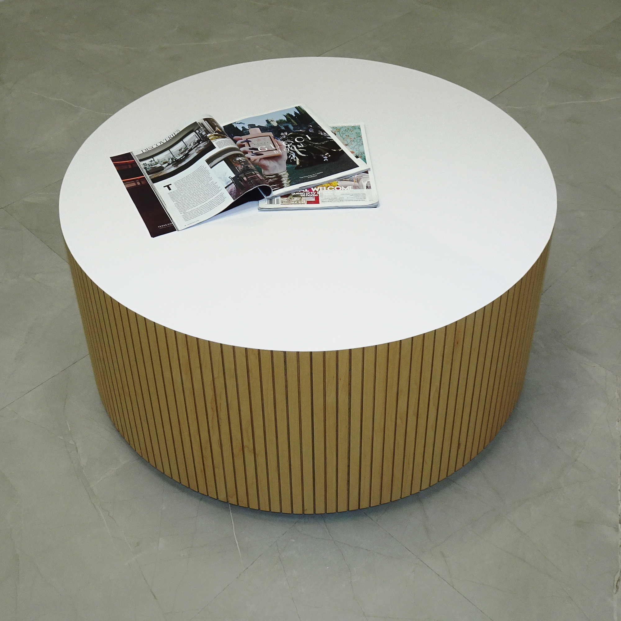 36-inch Norfolk Round Lobby Table in white gloss laminate table and maple tambour outside, shown here.
