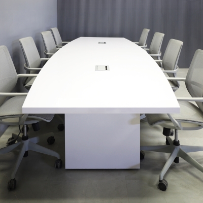 144-inch Newton Boat Shape Conference Table in white gloss laminate top and standard base, with silver MX3 powerboxes, shown here. 