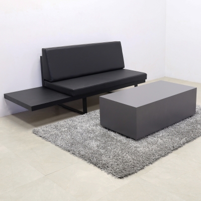 Astoria Custom Lobby Sofa in black leatherette, black matte laminate frame with extension and black metal legs shown here.
