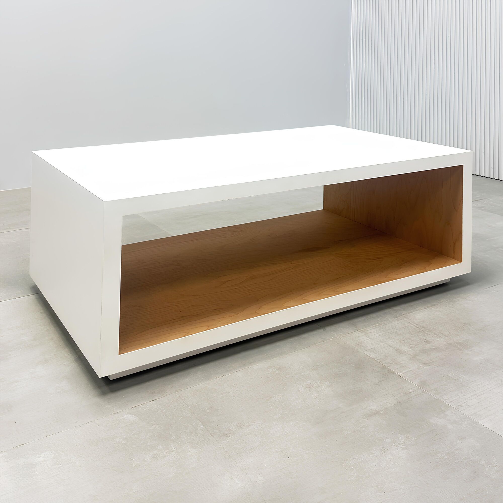 42-inch Albany Rectangular Lobby Table with Dover off-white matte laminate outside & toe-kick, and maple veneer inside.