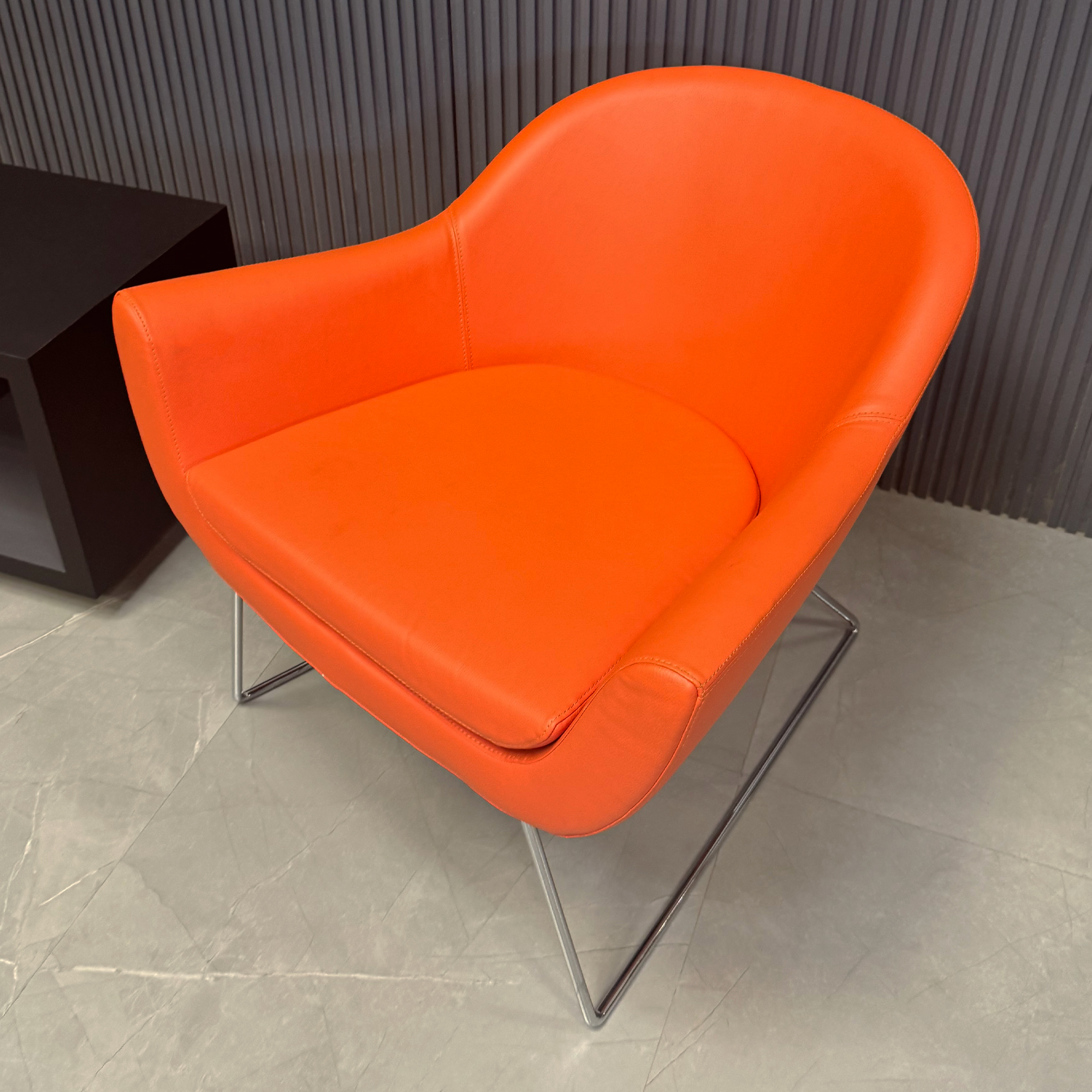 Madison Wire Sleed Lounge in Orange Leatherette - Set Of 2, shown here.
