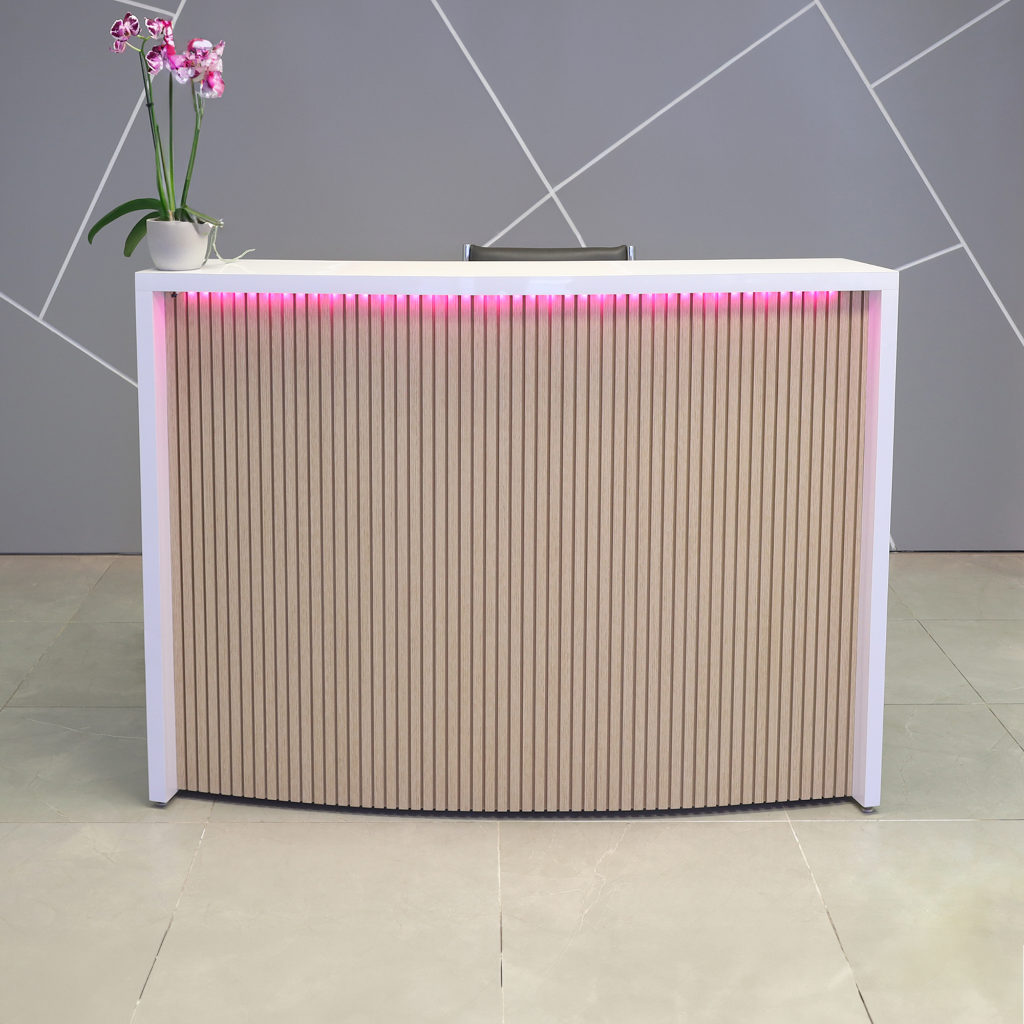72-inch Seattle X1 Custom Reception Desk in white gloss laminate desk and maple tambour on curved front panel, with multi-colored LED, shown here.