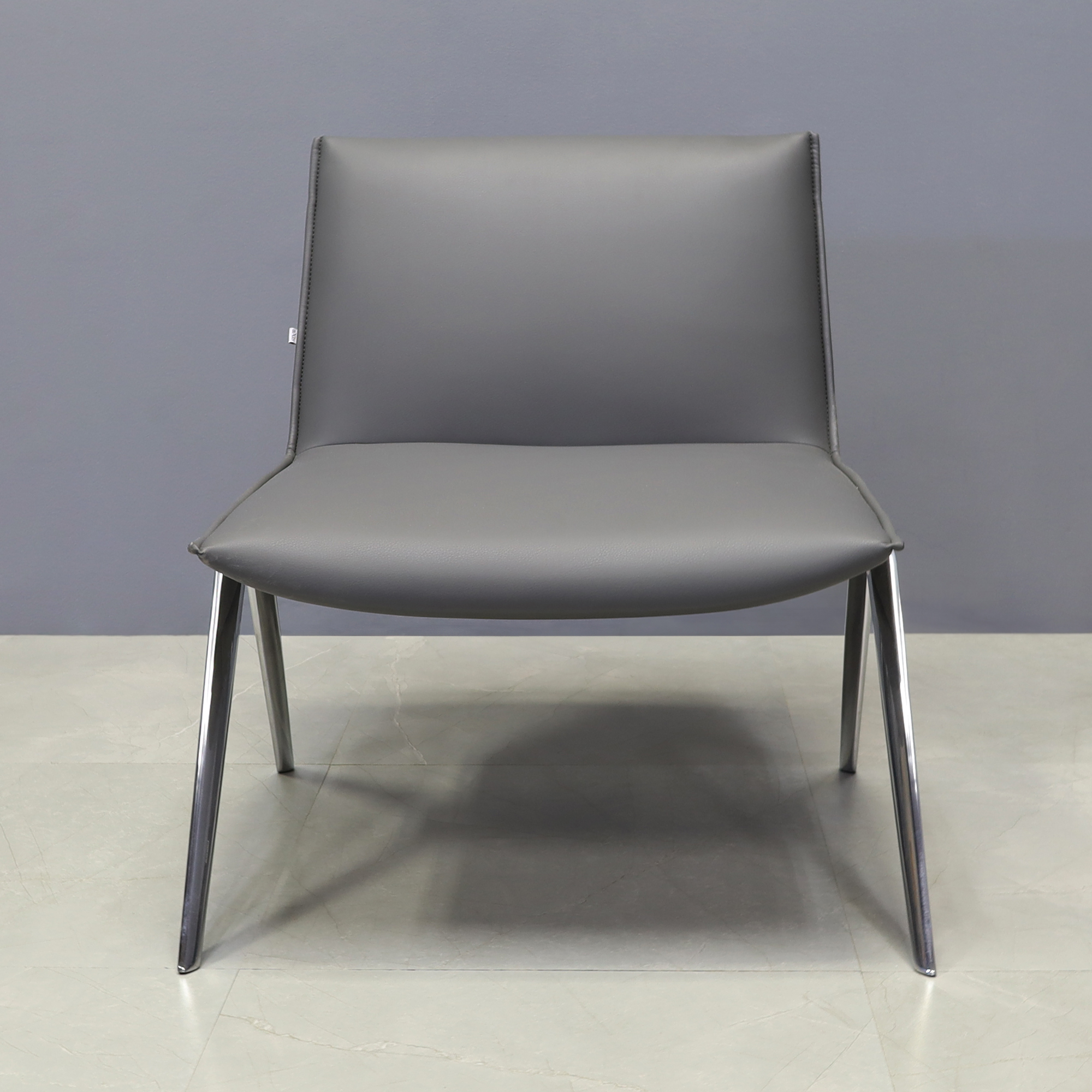 Monterra Lobby Chair in gray leatherette, shown here.