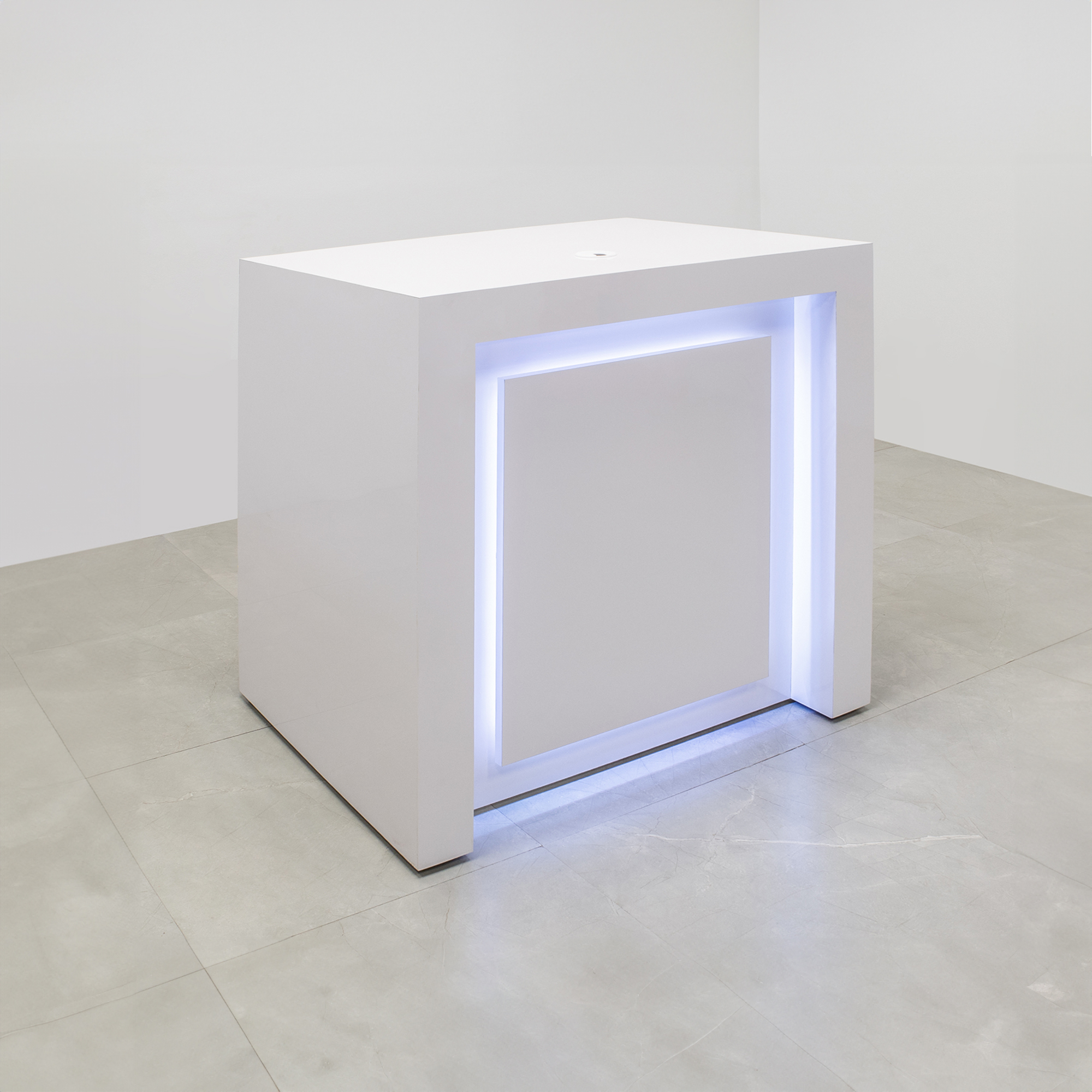 New York Retail CUstom Reception Desk in white matte laminate front panel and workspace, with multi-colored LED shown here.