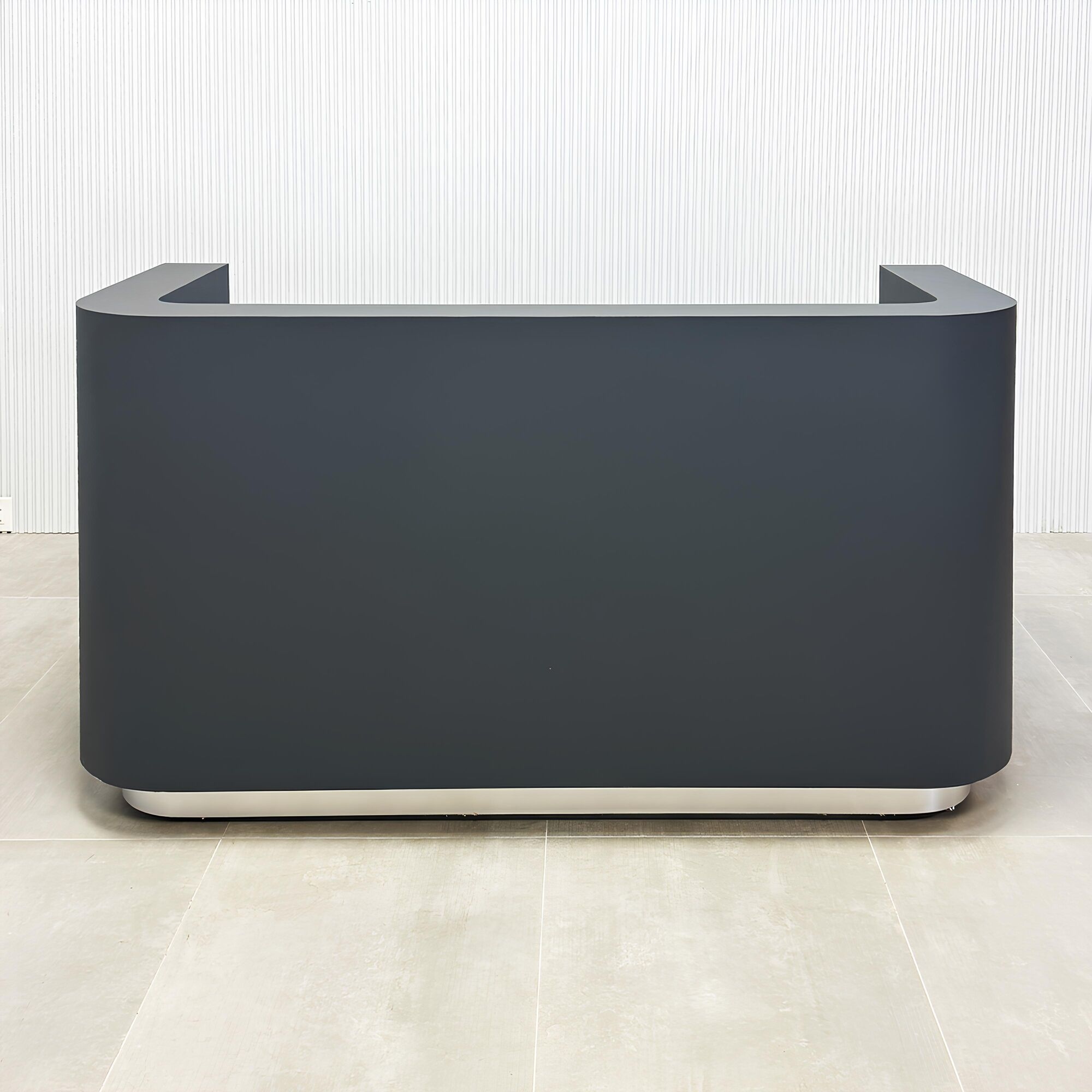 72-inch Nola U Reception Desk with dark gray traceless laminate desk & counter and brushed aluminum toe-kick.