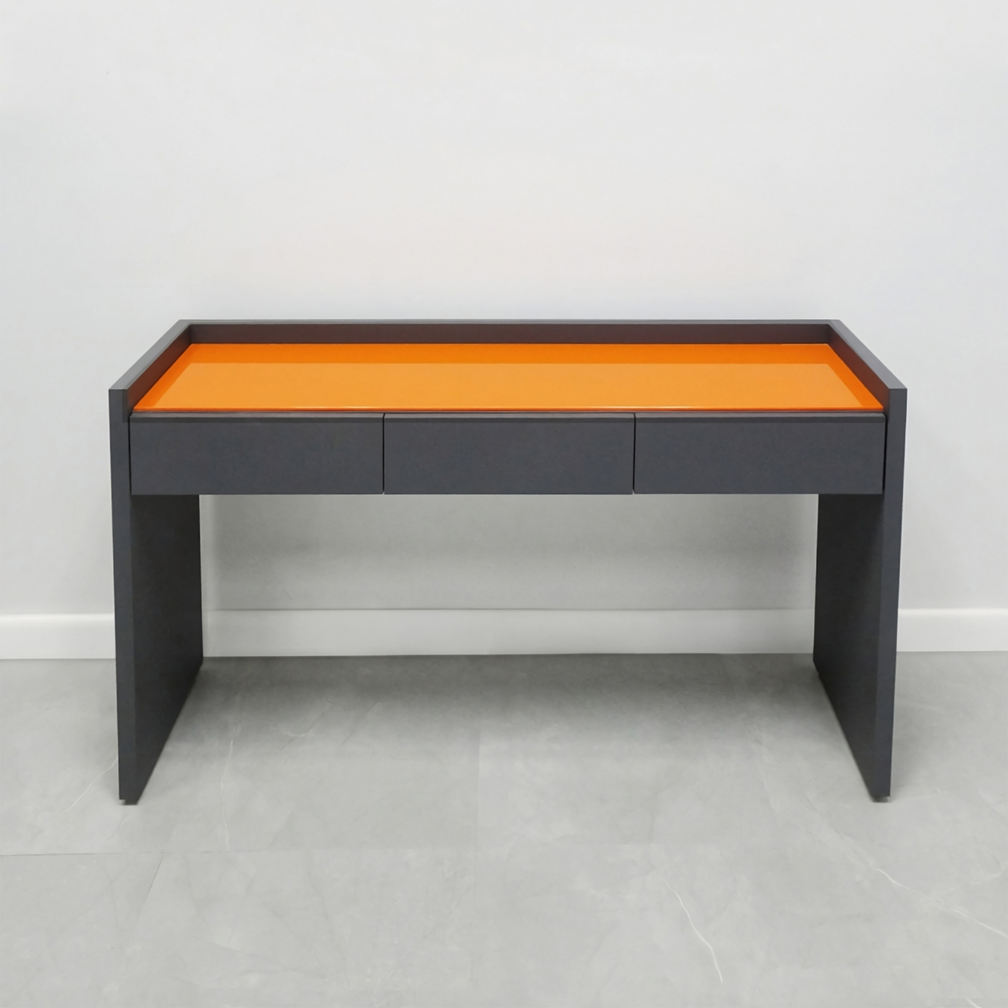 Avenue Console Table in orange tempered glass top and gray laminate console & front drawers shown here.