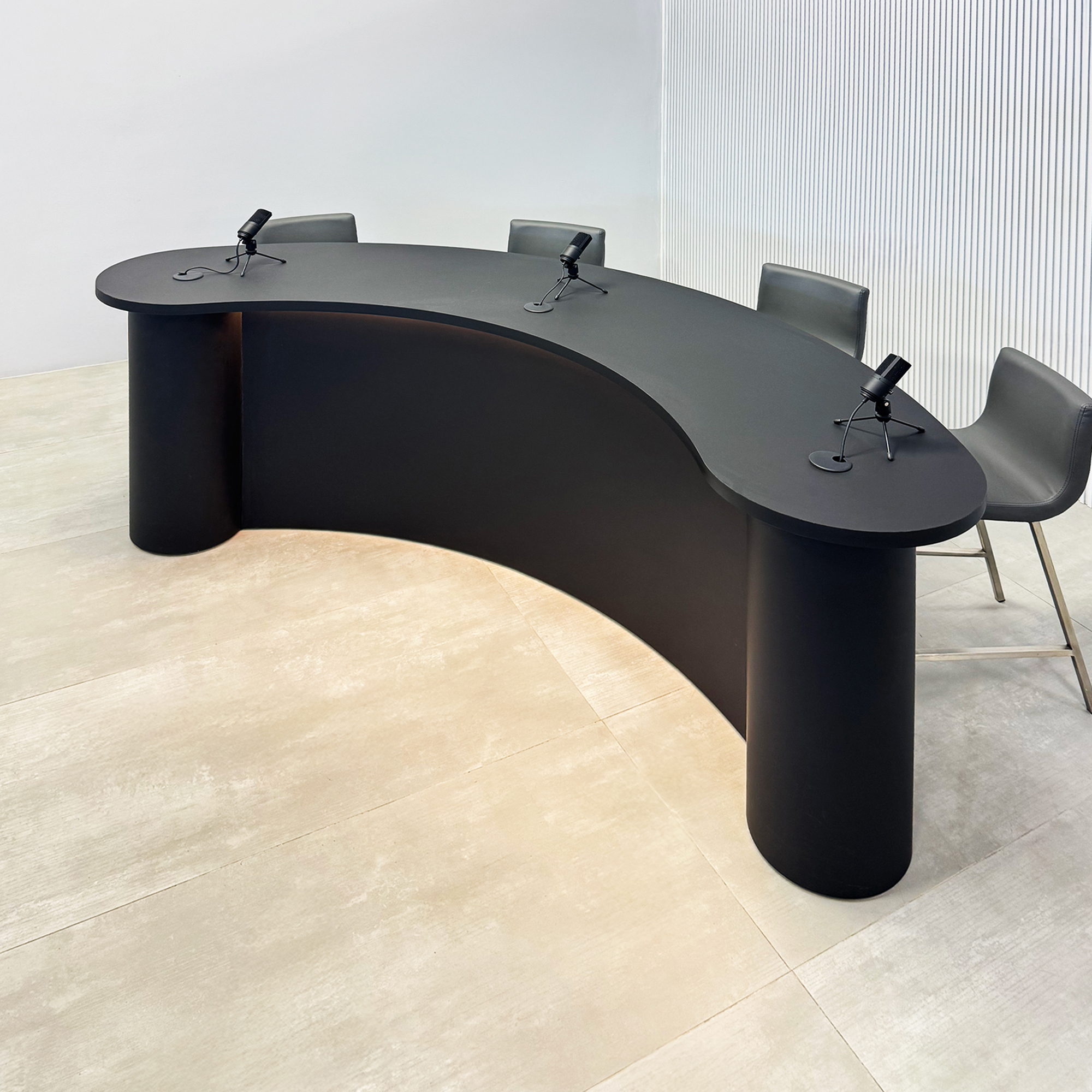 90-inch Rochester Custom Podcast Table with black traceless laminate top, black traceless laminate front of the base, black matte laminate back of the base, and warm white LED. 