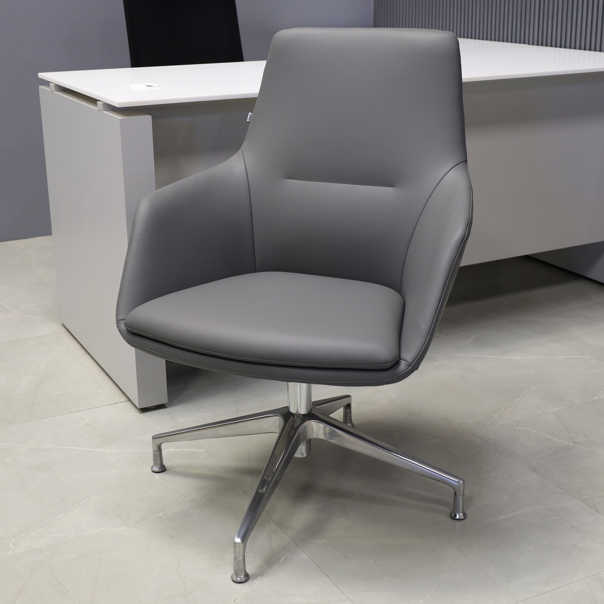 Silla Guest and Lobby Chair in gray leatherette, shown here.