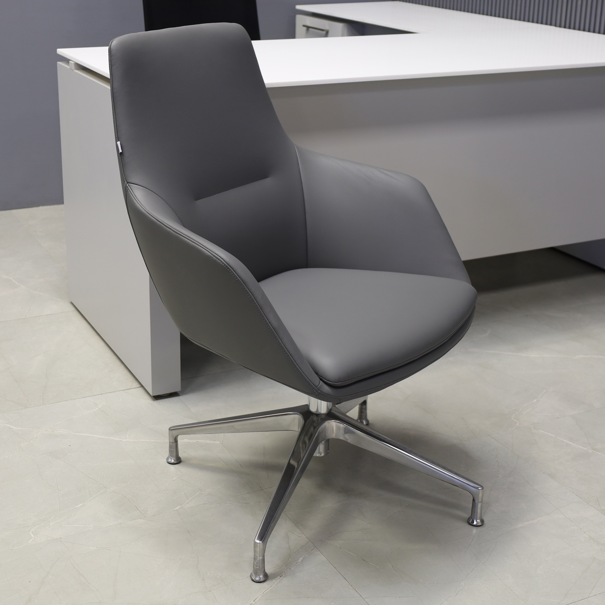 Silla Guest and Lobby Chair in gray leatherette, shown here.