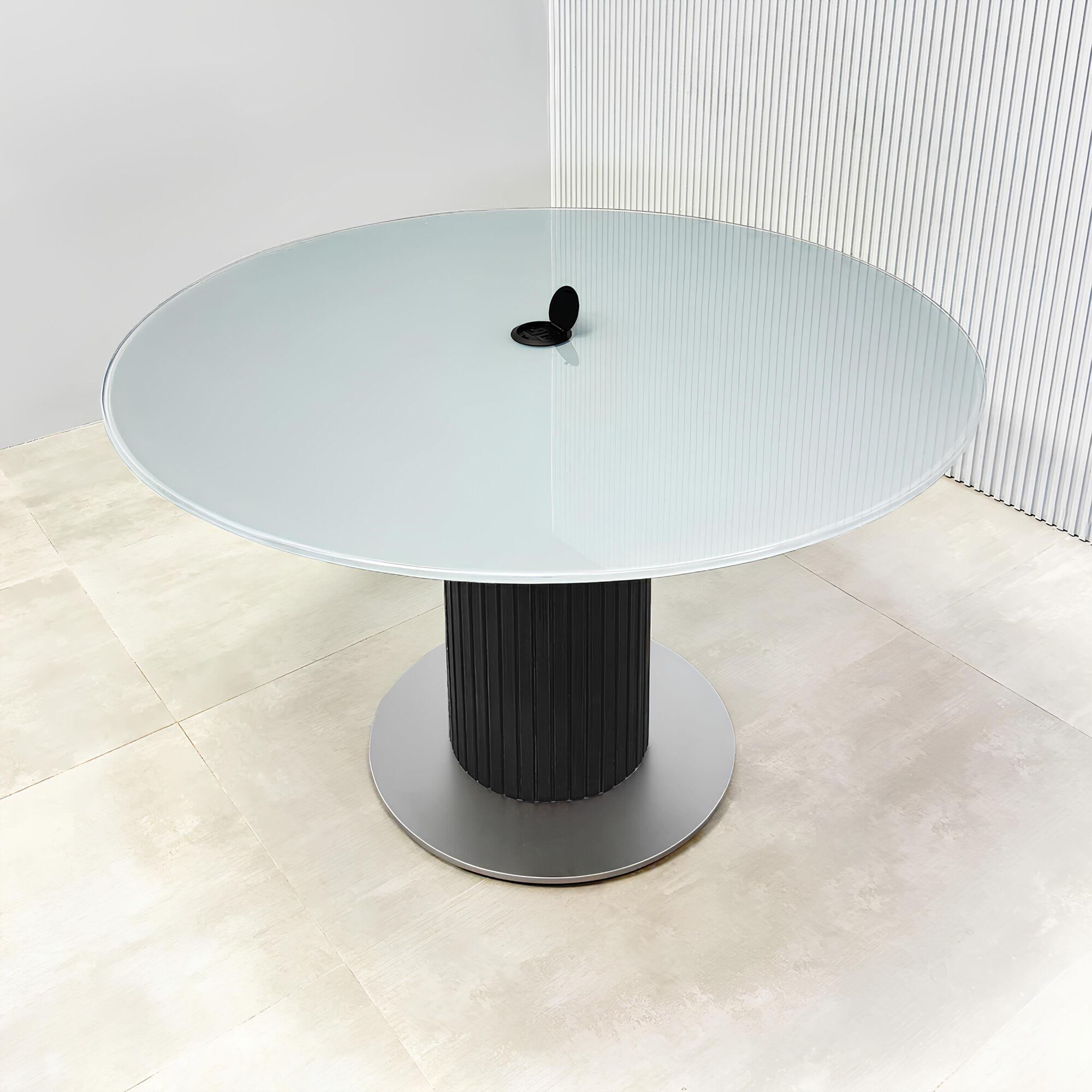 Omaha Round Conference Table with tempered glass top, black tambour pedestal, black base, and Mx1 in black.