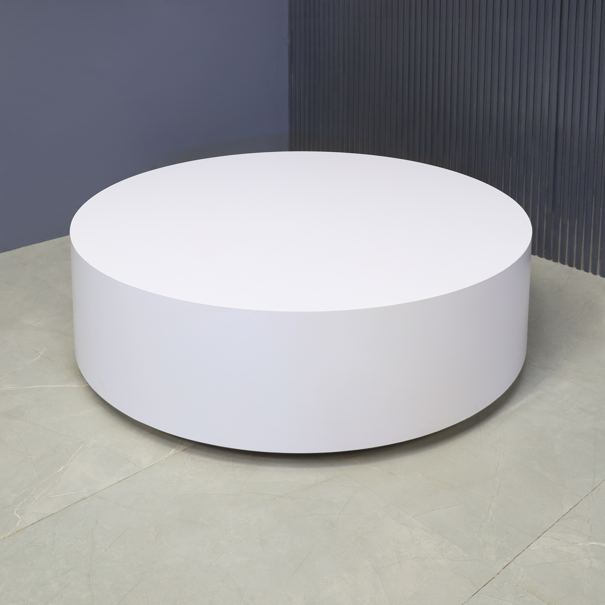 42-inch Norfolk Round Lobby Table in white matte laminate table and brushed aluminum laminate toe-kick, shown here.