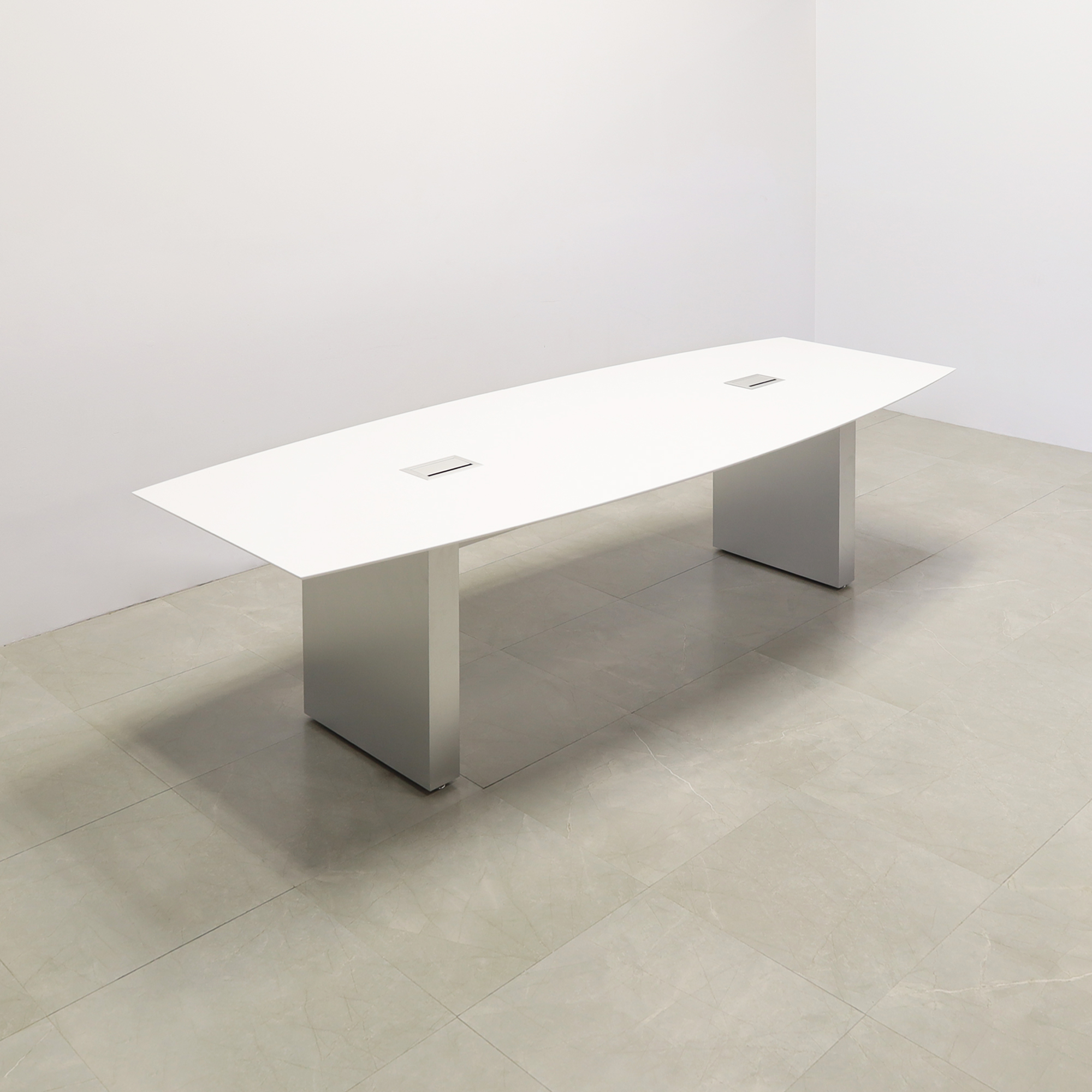 119 inches Aurora Boat Shaped Conference Table with White Solid Engineered Stone Top and Brushed Aluminum finish base, two Ellora power boxes shown here.
