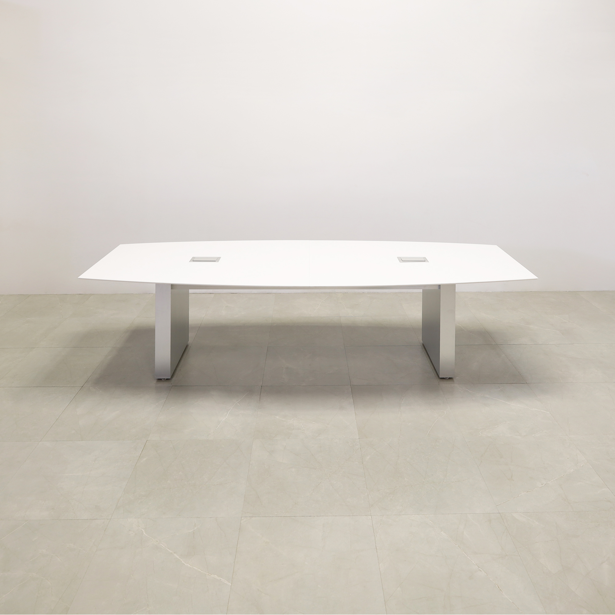 119 inches Aurora Boat Shaped Conference Table with White Solid Engineered Stone Top and Brushed Aluminum finish base, two Ellora power boxes shown here.