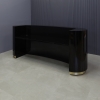 The Pill Custom Reception Desk in black gloss laminate desk and brushed gold toe-kick shown here.