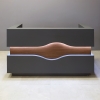 72-inch Wave Reception Desk in dark gray traceless laminate counter, desk & toe-kick, and walnut height matte laminate wave accent, with warm white LED, shown here.