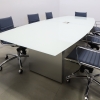 Omaha Boat Shape Conference Table With Tempered Glass Top in taupe top and brushed aluminum base, with one ellora power box shown here.