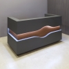 72-inch Wave Reception Desk in dark gray traceless laminate counter, desk & toe-kick, and walnut height matte laminate wave accent, with warm white LED, shown here.