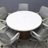 48-inch Newton Round Conference Table in white gloss laminate top and walnut tambour base, with white MX1 powerbox, shown here.