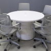 48-inch Newton Round Conference Table in white gloss laminate top, and white gloss tambour base, with white MX1 powerbox, shown here.