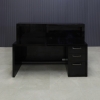 Vegas Custom Reception Desk in black gloss laminate counter and desk, with multi-colored LED, built-in two pencil drawers and one file cabinet sitting view side shown here.