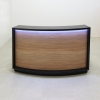 Seattle X2 Reception Desk in Black Matte Laminate Desk and Uptown Walnut Front Panel, with colored LED shown here.
