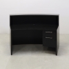Seattle X2 Reception Desk in Black Matte Laminate Desk and Uptown Walnut Front Panel, with colored LED, seating side view shown here.