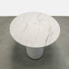 Aurora Oval Conference Table With Engineered Stone Top in solenne marble top and white matte laminate base, with one nacre power box shown here.