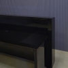 84-inch Vegas Reception Desk with Light Box in black gloss laminate counter. desk and toe-kick, black acrylic tambour front panel and white LED shown here.