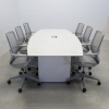 Aurora Boat Shape Conference Table With Engineered Stone Top in spanish limestone top and white matte laminate base with one ellora power box shown here.