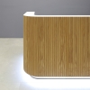 90-inch Nola Reception Desk in white oak tambour on main desk and white matte laminate for the workspace and toe-kick, with white LED shown here.