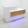 Atlanta reception desk with white gloss finish, white oak tambour front accent and colored LED shown here. 