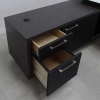 One pull-out drawer and file cabinet in the credenza included with black traceless laminate. 