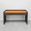 Aspen Console Table is shown here with a Dark Gray traceless Laminate Base and Orange Glass.