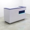 Manhattan reception desk is shown here with a White Gloss Laminate Base and customizable LED lights in a variety of colors.
