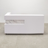 Manhattan reception desk is shown here with a White Matte finish with a Calcutta Marble accent, with Aluminum Toe Kick, and comes with customizable LED light colors.