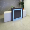 108-inch New York Extra Wide Custom Reception Desk in storm gray gloss laminate counter and front panel, and white ash laminate desk, with multi-colored LED, shown here.