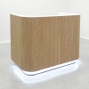 Nola reception desk in white matte finish with maple veneer tambour accent features LED which has a remote included.