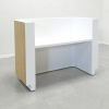 Nola reception desk in white matte finish with maple veneer tambour accent features LED which has a remote included.