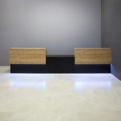 168-inch Los Angeles Double Counter ADA Compliant Custom Reception Desk in planked urban oak counters black matte laminate desk, with color LED shown here.