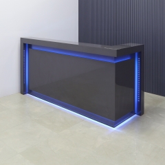 New York L-Shape Custom Reception Desk in storm gray gloss laminate front panel, desk and workspace, with multi-colored LED shown here.