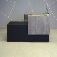 Los Angeles Custom Reception Desk in concrete laminate counter and black traceless laminate desk shown here. 